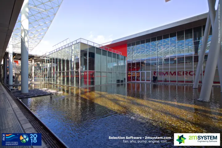 Reflecting pool in front of a glazed hall with Immergas lettering at MCE 2018