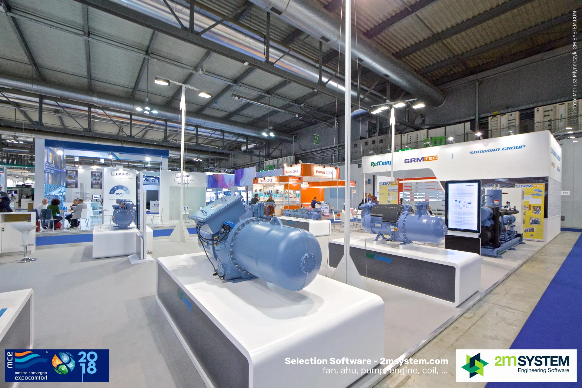 Screw compressor on a RefComp plinth with the stand fascia behind at MCE 2018