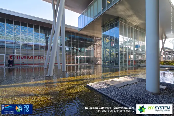 Slanted columns and glass stair tower over the pool by the Immergas hall at MCE 2018