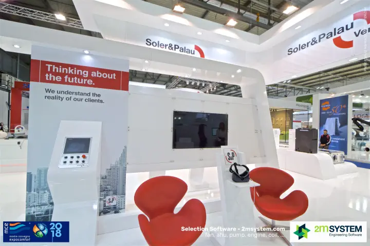 Soler & Palau VR corner with red swan chairs and control panel