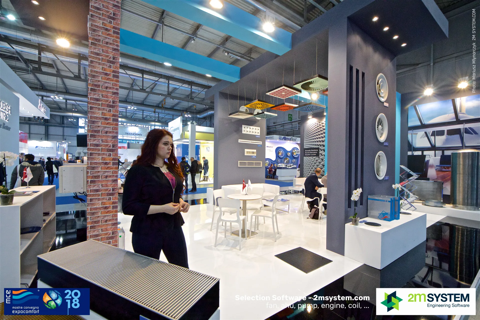 Staff member beside a floor convector at Elektroteknik at MCE 2018