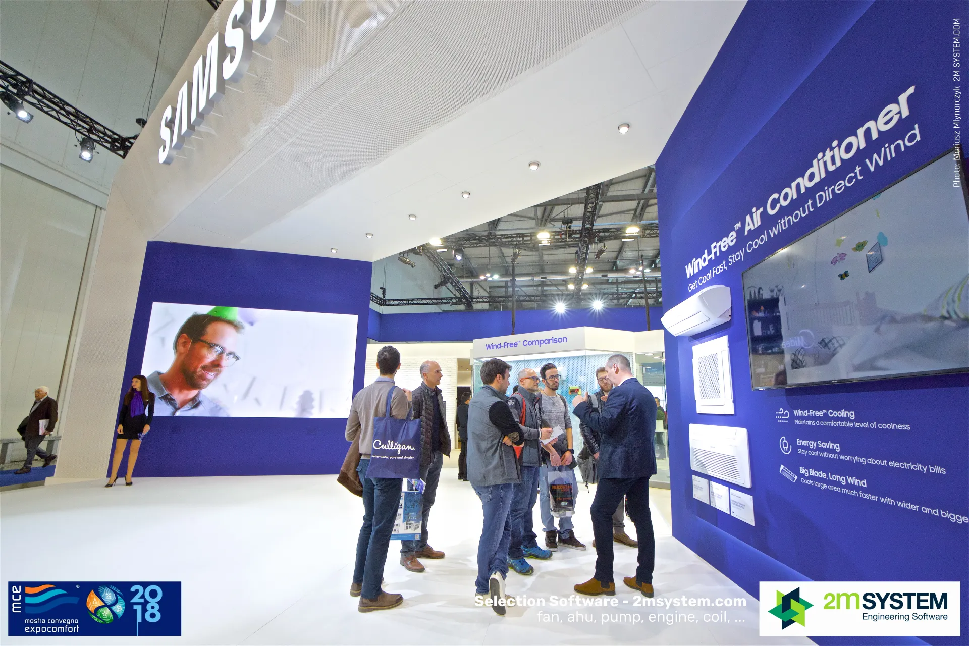 Staff presenting Wind-Free wall, cassette and console units to visitors at MCE 2018