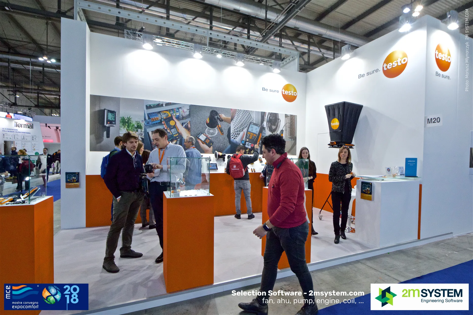 Testo stand M20 with orange plinths and a flow hood display at MCE 2018