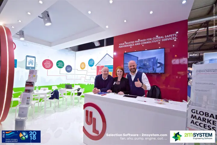 UL team at the reception counter in front of the red brand wall at MCE 2018