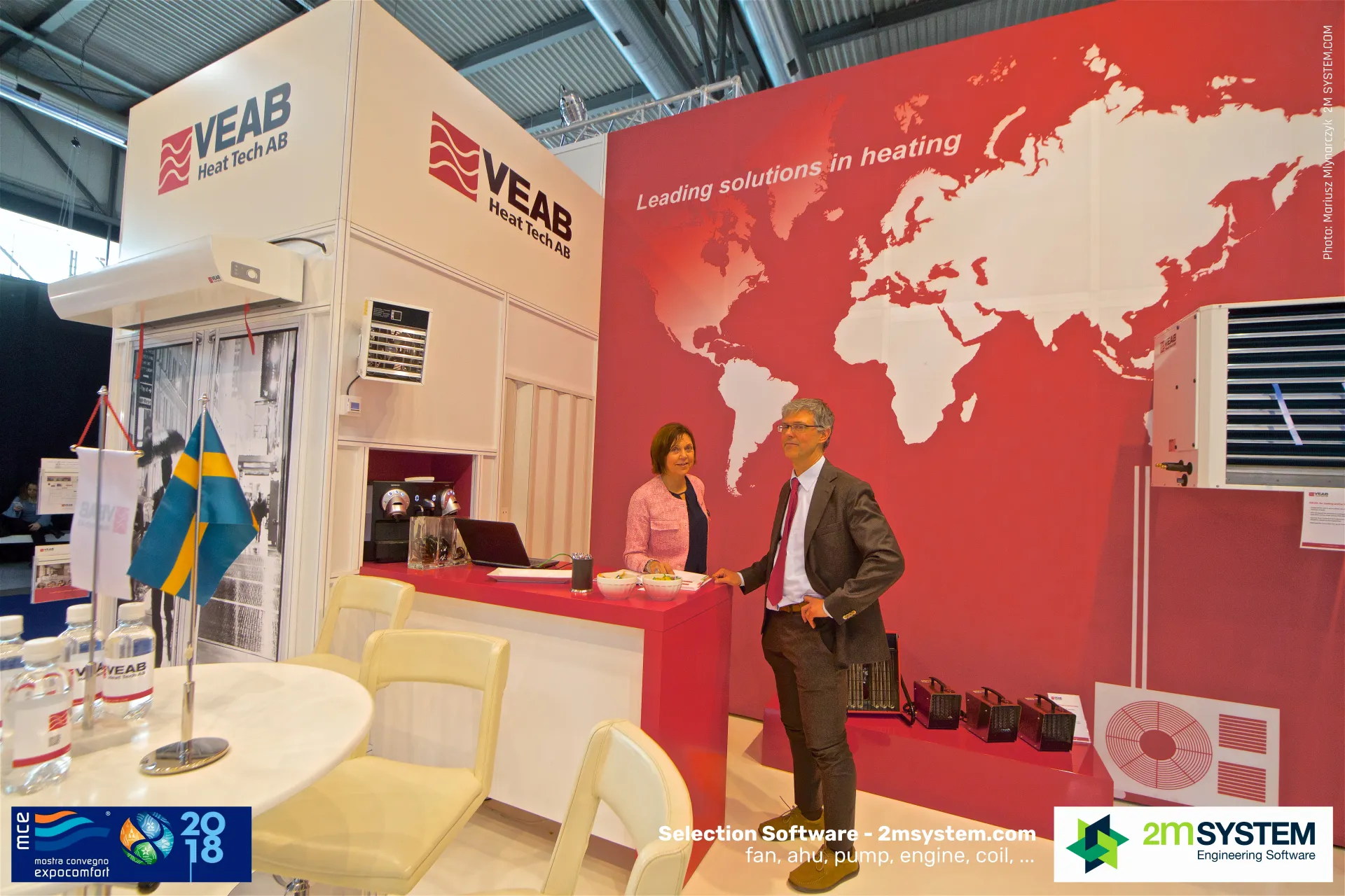 VEAB team at the red counter beside portable electric heaters at MCE 2018
