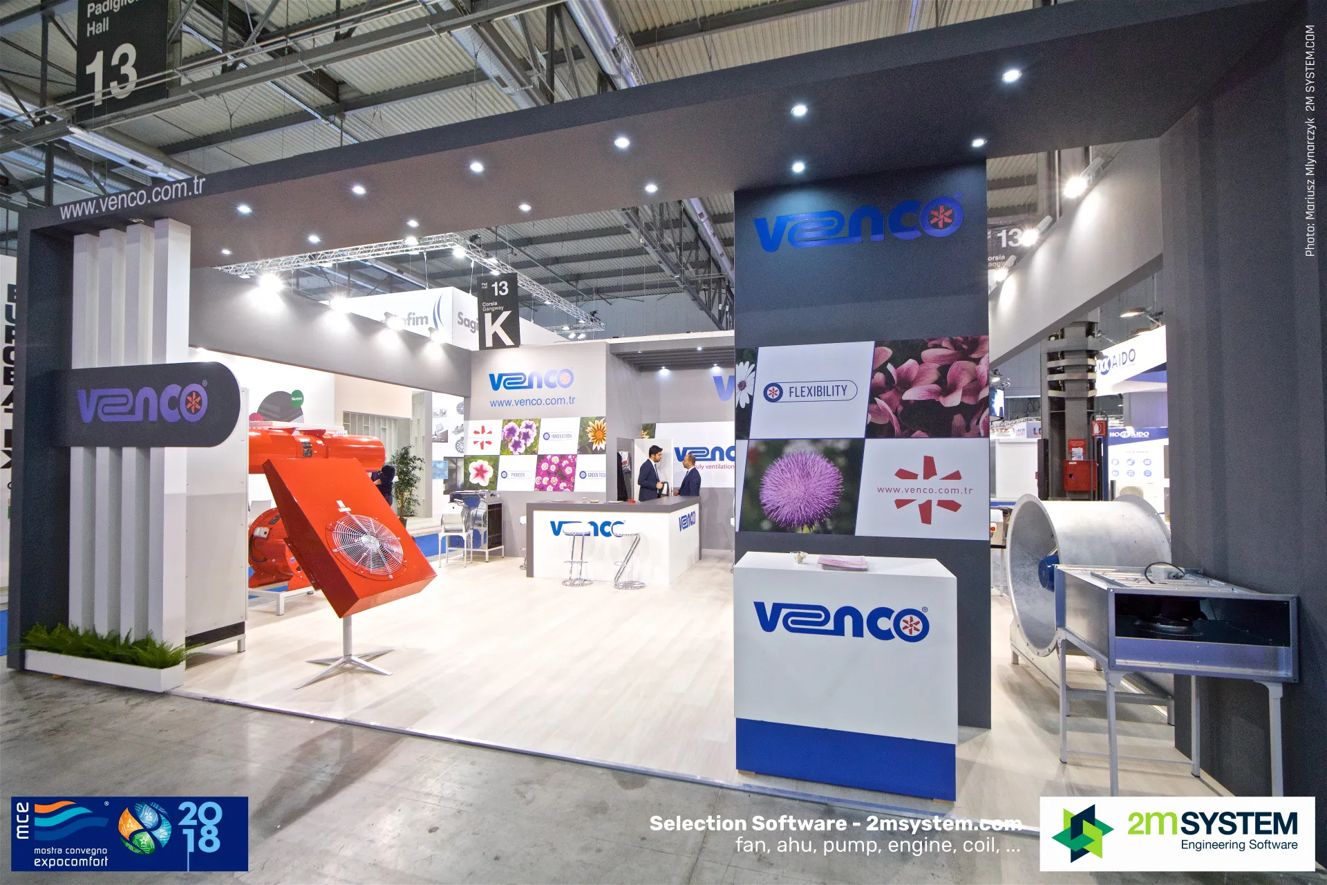 Venco stand entrance with tilted red axial fan and large duct fan at MCE 2018