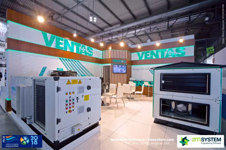 Ventas packaged unit and roofed outdoor AHU under green-lit fascia