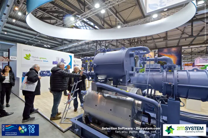 Visitors discussing a large GEA compressor package at MCE 2018