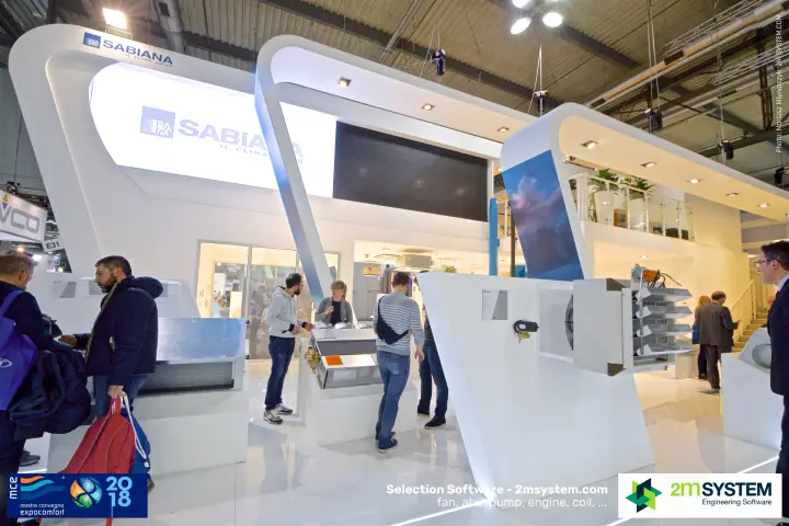 Visitors examine Sabiana ducted units below the two-level stand