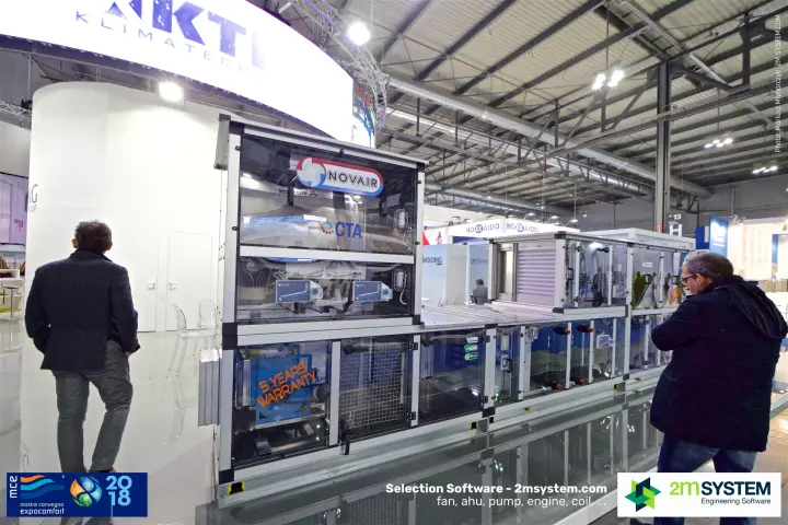 Visitors inspecting a transparent Novair AHU on the G.I. Holding stand at MCE 2018
