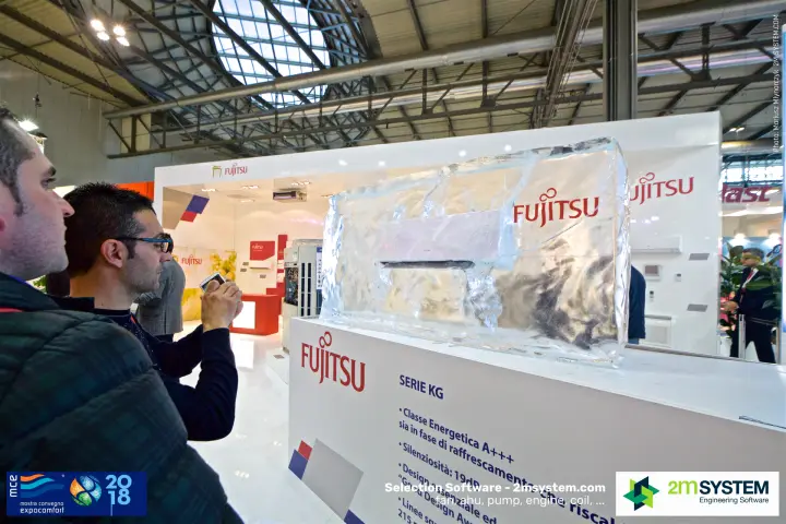 Visitors photograph the Fujitsu split unit frozen in ice at MCE 2018