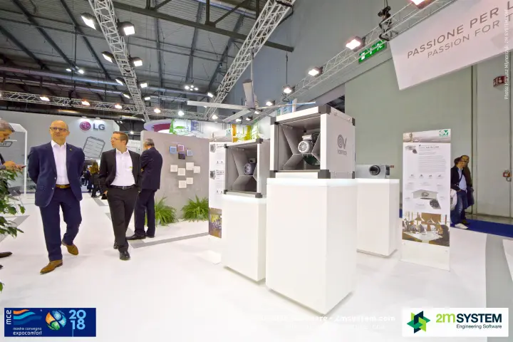 Vortice box fans and CA In-Line series panel under a hanging slogan banner at MCE 2018