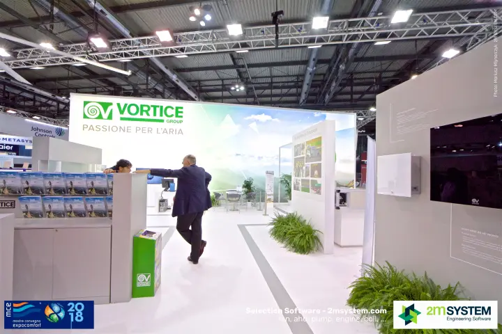 Vortice Group stand entrance with brochure counter and backlit landscape wall