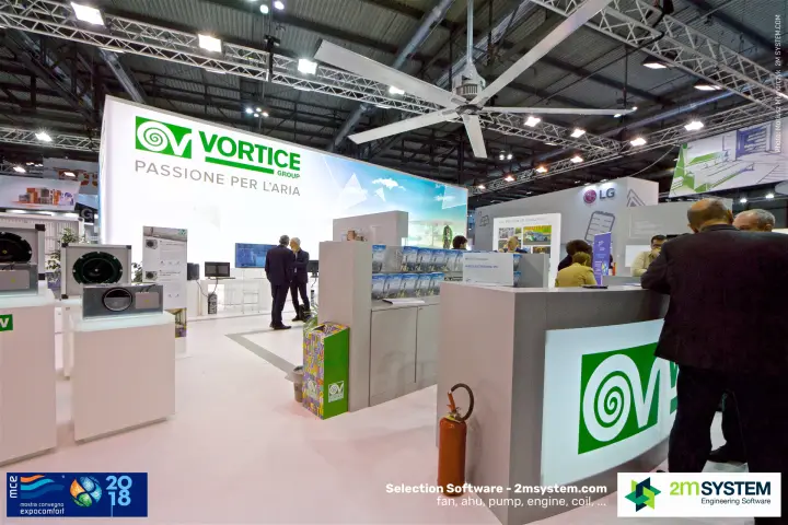 Vortice reception counter with spiral logo and large ceiling fan