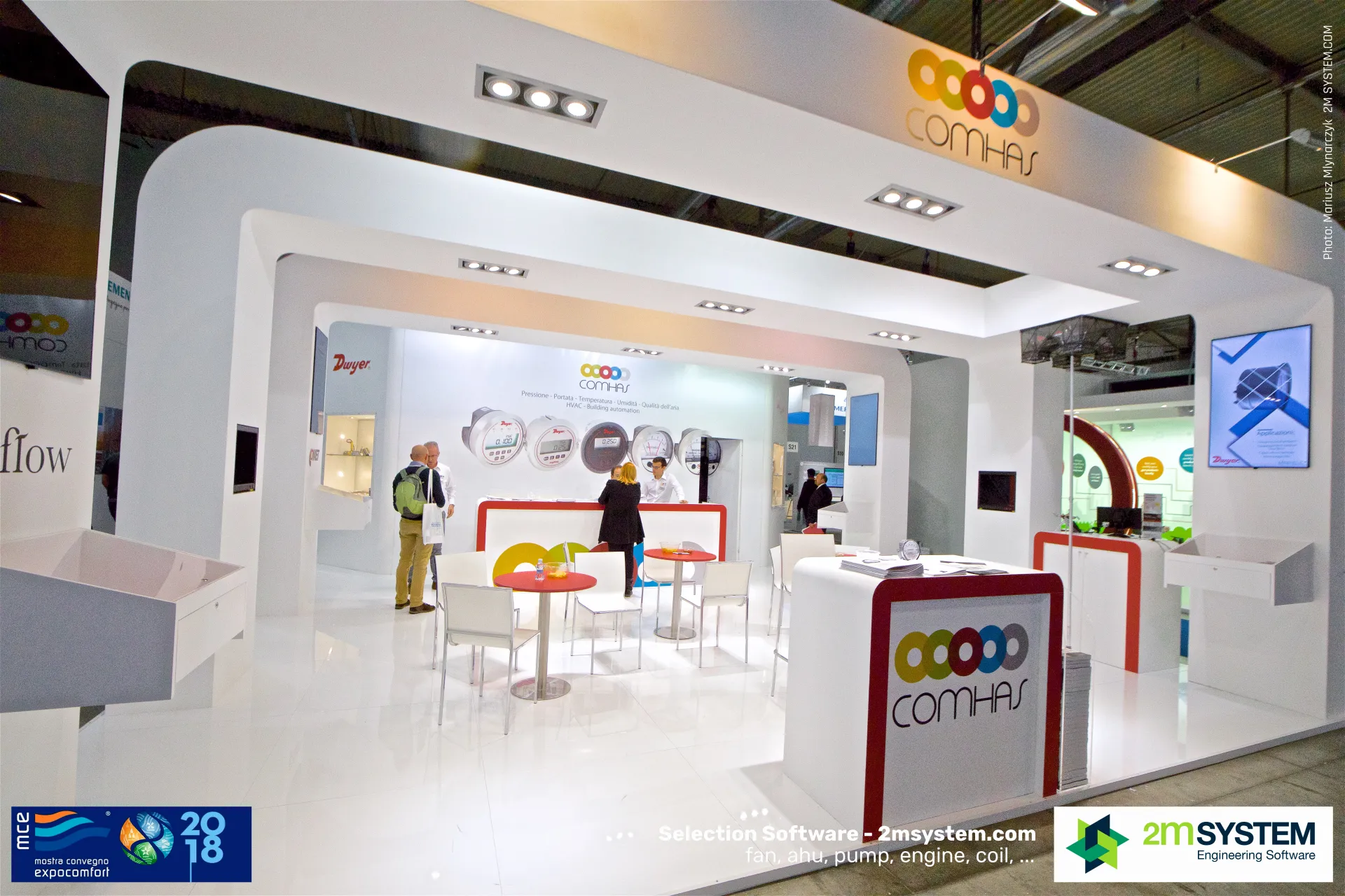 White Comhas stand with Dwyer pressure gauges on the back wall at MCE 2018