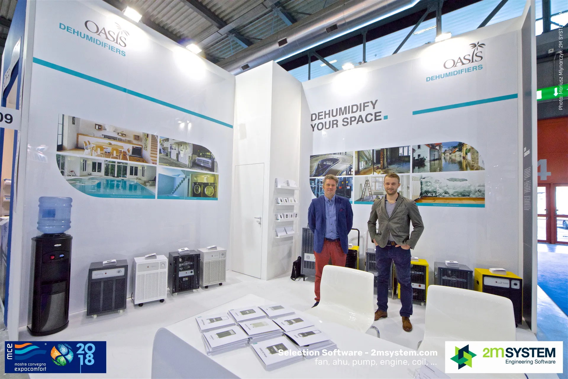 Wider view of the Oasis stand with brochures and dehumidifiers at MCE 2018