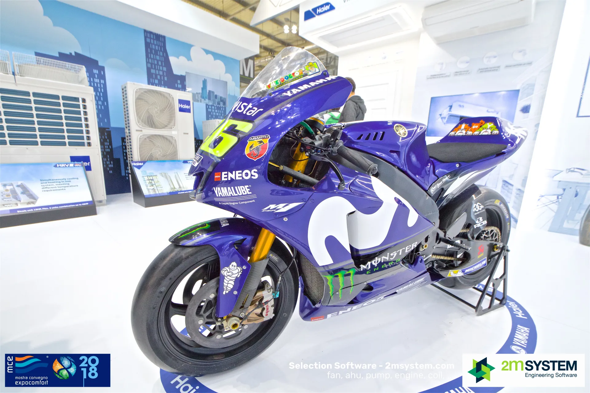 Yamaha racing motorcycle on a Haier platform in front of MRV units at MCE 2018