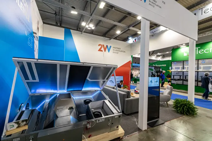 2VV heat recovery unit with raised lid and LED lighting at the stand front at MCE 2024