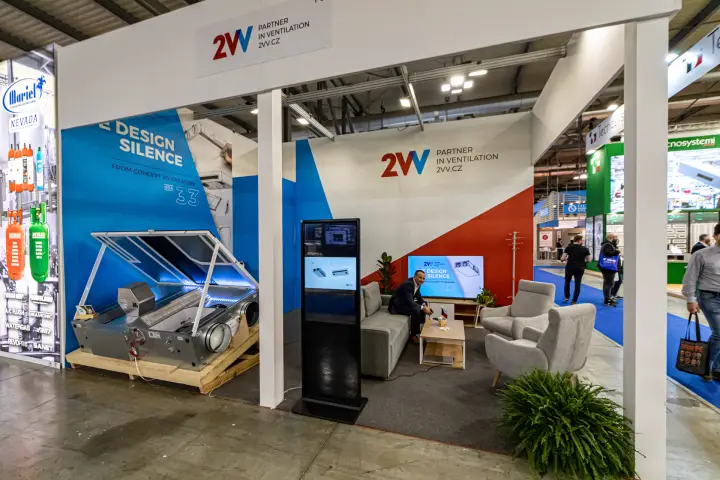 2VV stand with opened heat recovery unit on a pallet and lounge seating at MCE 2024