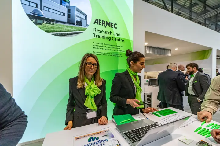 Aermec reception counter with Masterclima software presentation sign at MCE 2024
