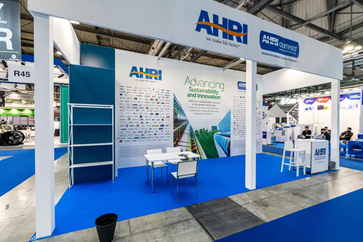 AHRI stand with member logo wall and 'Advancing Sustainability' graphic