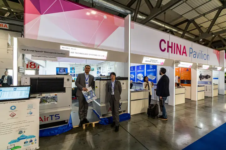 AirTS large-space heating and cooling units beside the Liaoyuan Burner booth at MCE 2024