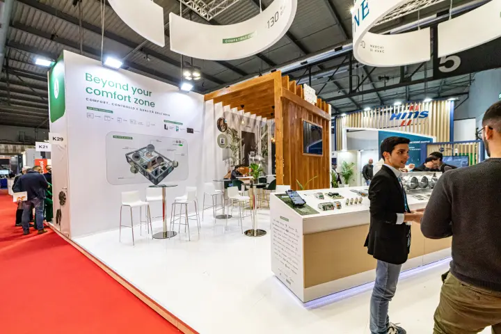 Airzone booth K29 with lounge area and zoning controls counter at MCE 2024