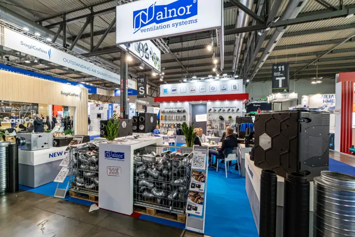 Alnor ventilation systems stand with duct bends in wire crates