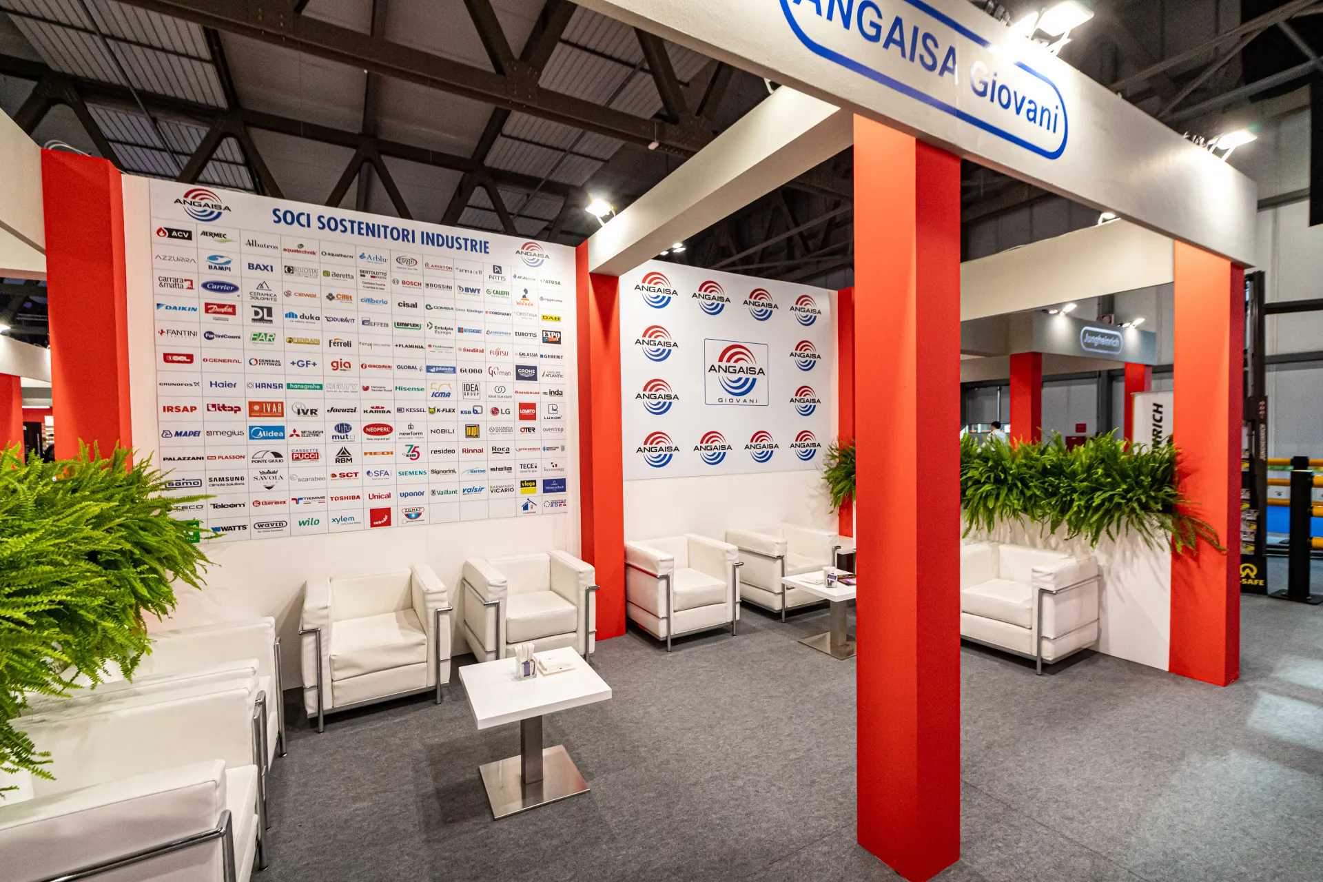 Angaisa Giovani lounge with supporting members logo wall at MCE 2024