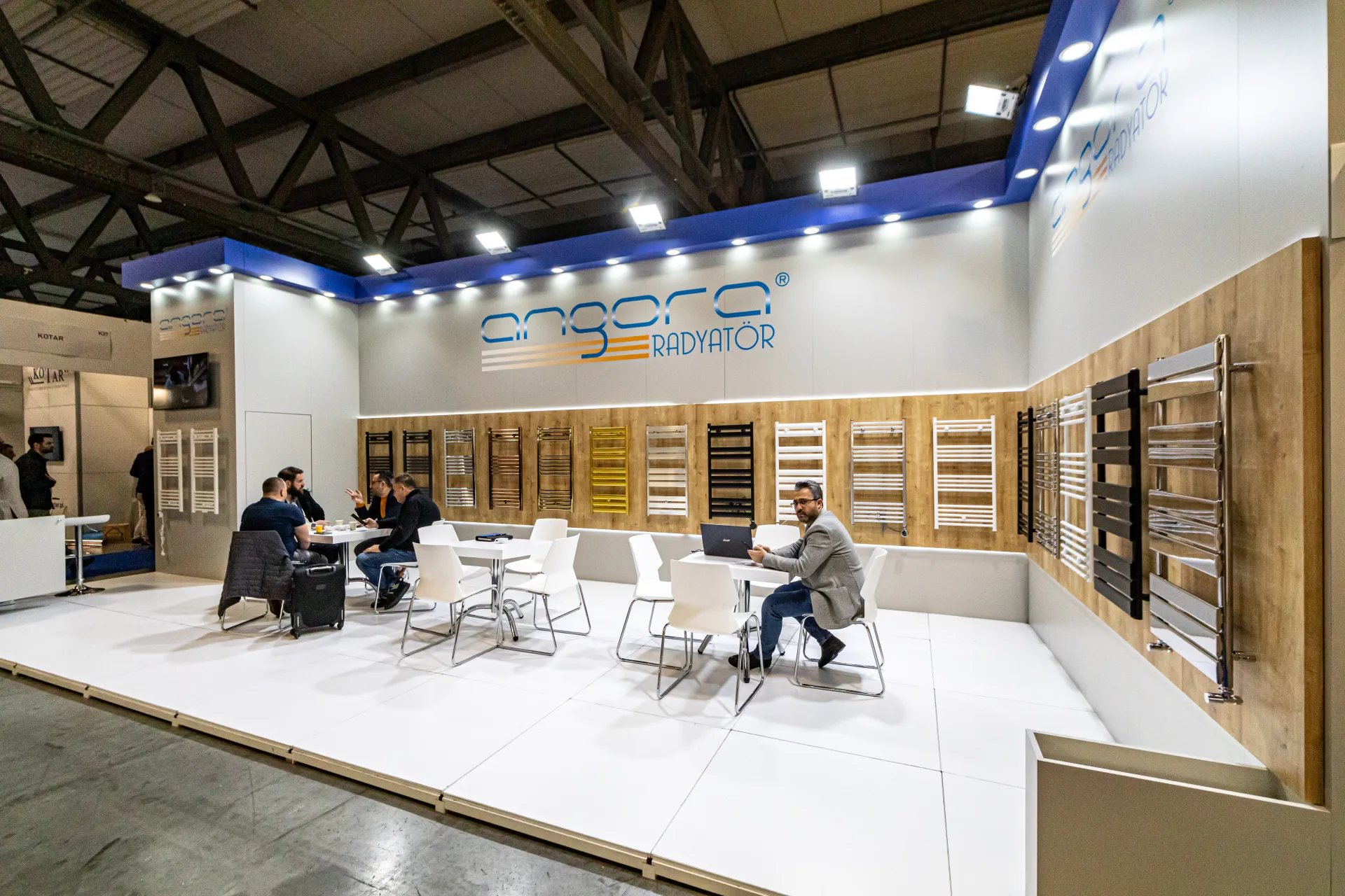 Angora Radyatör corner stand with a row of towel radiators at MCE 2024
