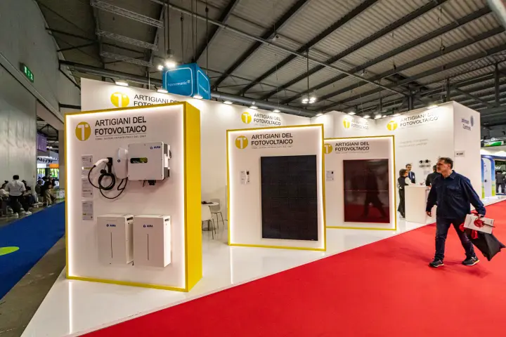 Artigiani del Fotovoltaico stand with Aura inverter, batteries and PV panels at MCE 2024