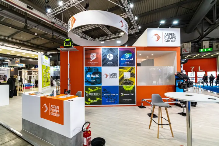 Aspen Pumps Group stand with brand grid and suspended ring sign