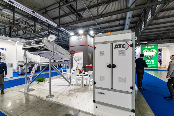 ATC stand with tall cabinet unit and ceiling unit on a display frame