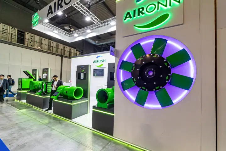 Backlit Aironn impeller wall and suspended logo banner over the stand at MCE 2024