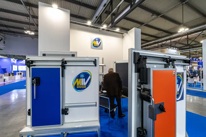 Blue and orange MIV cold room door samples on display