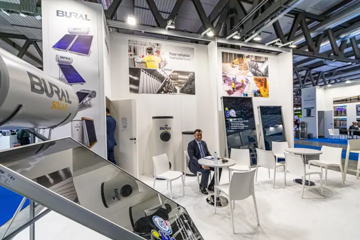 Bural Solar stand with thermosiphon solar water heater in the foreground at MCE 2024