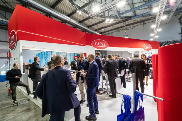 Busy Carel stand bar with energy efficiency wall graphics at MCE 2024