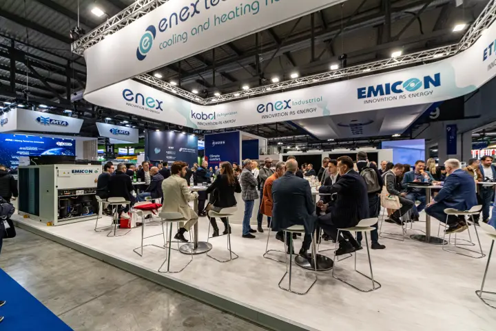 Busy Enex Technologies lounge with an open Emicon unit at MCE 2024