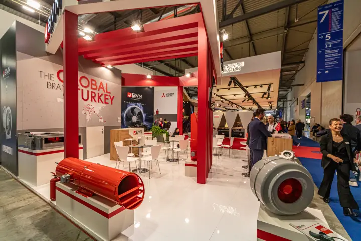 BVN red jet fan and grey inline duct fan on display plinths at MCE 2024