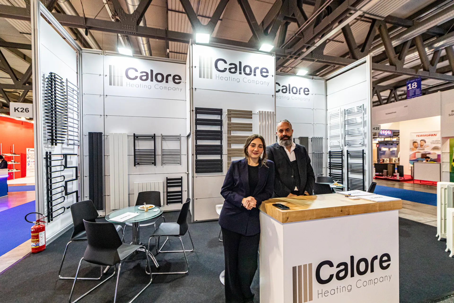 Calore Heating Company stand with towel warmers and designer radiators at MCE 2024