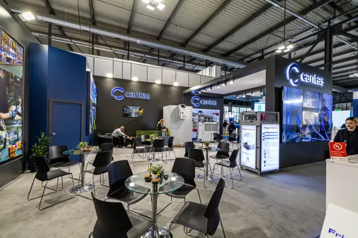 Cantaş lounge with black chairs and FrigoHORECA light boxes at MCE 2024
