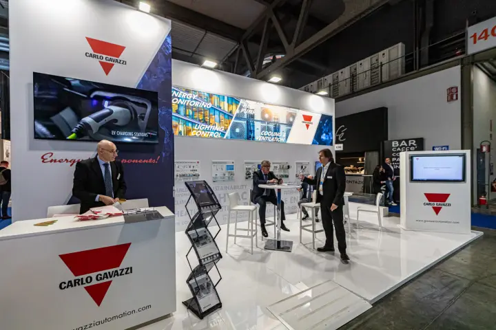 Carlo Gavazzi stand with energy monitoring and EV charging graphics at MCE 2024