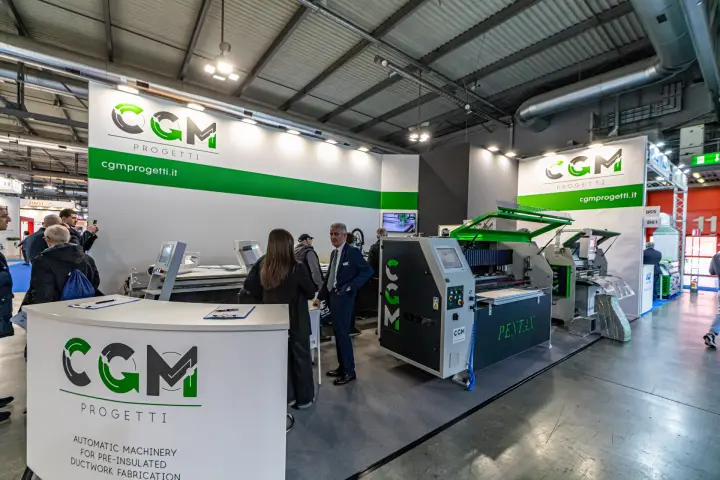 CGM Progetti stand with ductwork fabrication machines and reception counter