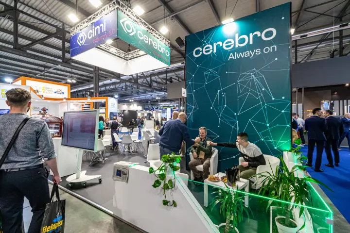 Cimi cerebro 'Always on' tower and lounge with hanging banner at MCE 2024