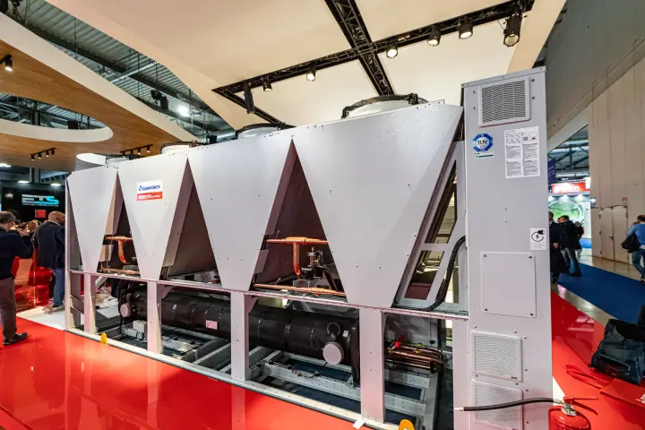 Climaveneta air-cooled chiller with V-shaped coils on a red floor at MCE 2024