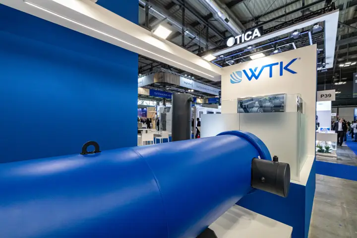 Close-up of a blue cylindrical heat exchanger on the WTK stand at MCE 2024