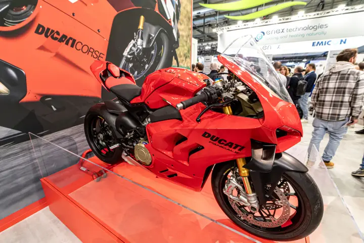 Close-up of a red Ducati Panigale on a display plinth at MCE 2024