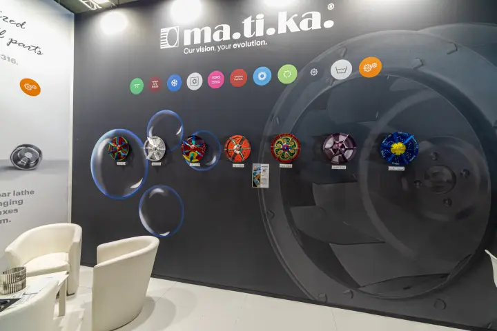 Close view of the decorated impellers on the Matika graphic wall at MCE 2024