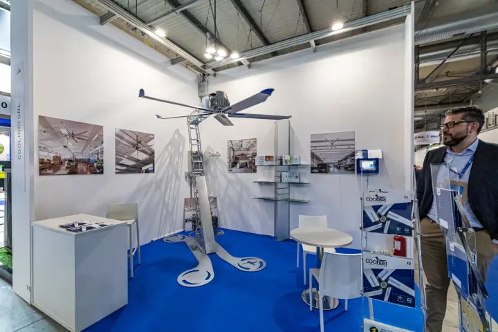 Coolibri stand with a large ceiling fan on a freestanding frame