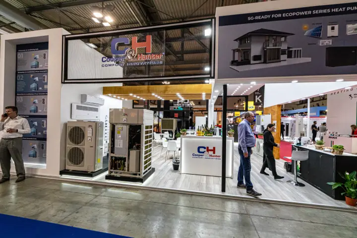 Cooper&Hunter stand with an opened VRF outdoor unit and SG-Ready heat pump graphic at MCE 2024